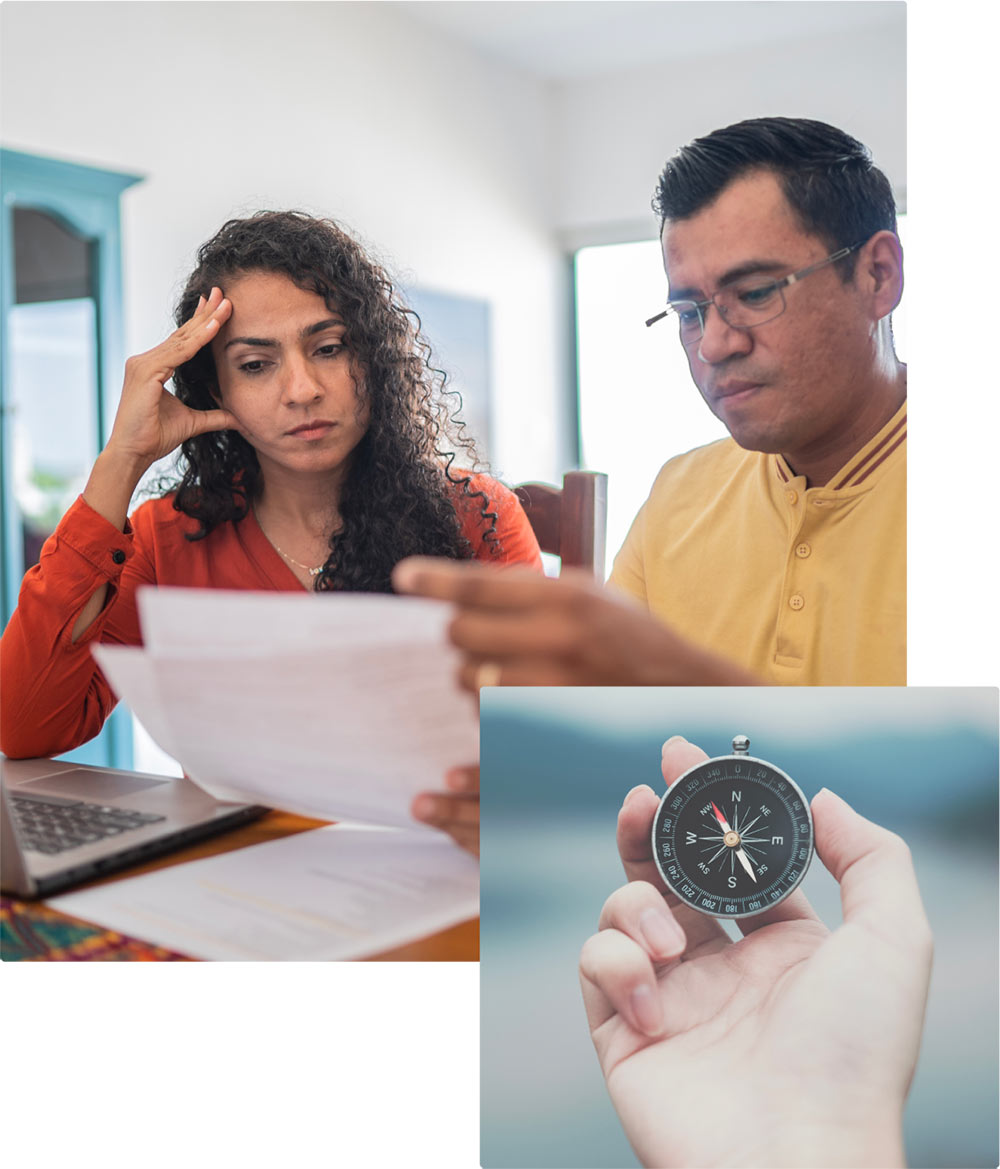 A man and woman look over immigration papers with frustration and speak to Immigration Consultants in Canada on the computer.